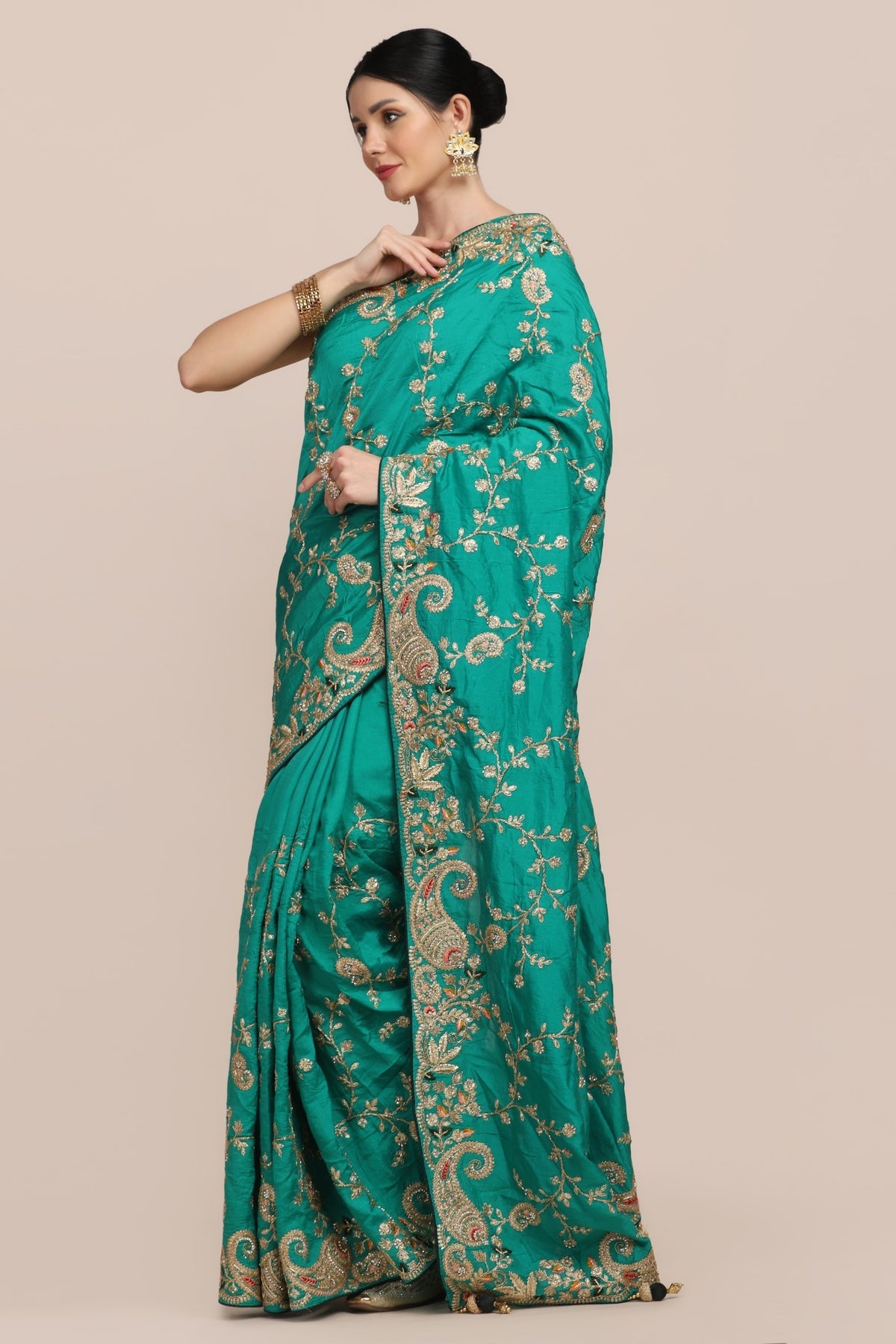 Beautiful peacock green color paisley motif embroidered saree