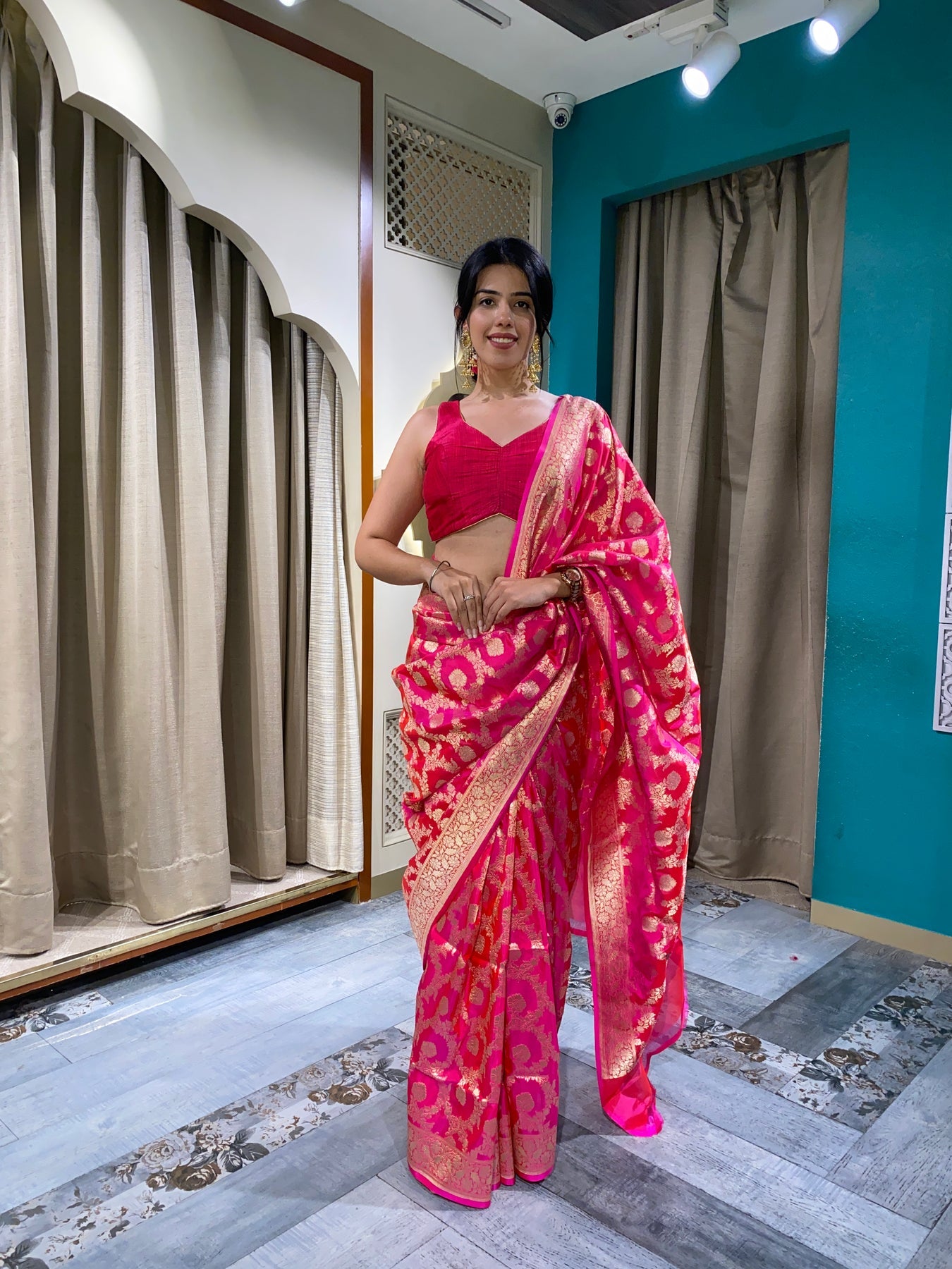 Elegant dark pink color floral motif hand woven saree