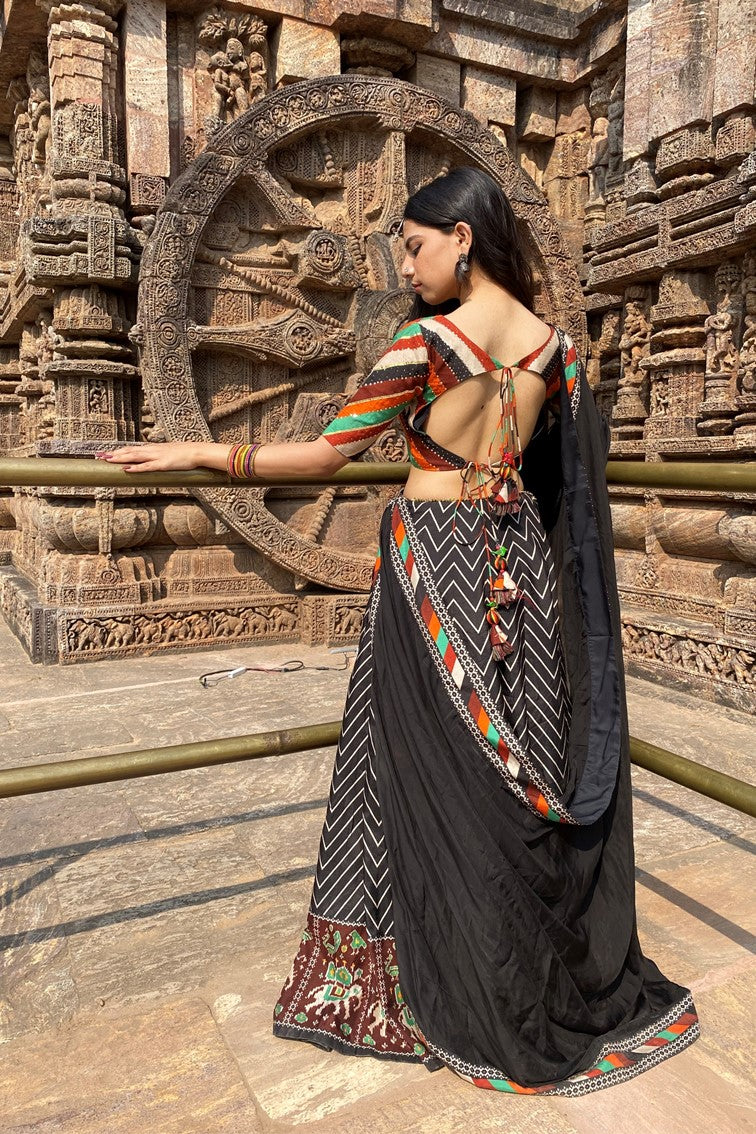 Beautiful chevron stripes printed having patola motif border lehanga with multi colored stripes blouse and matching dupatta