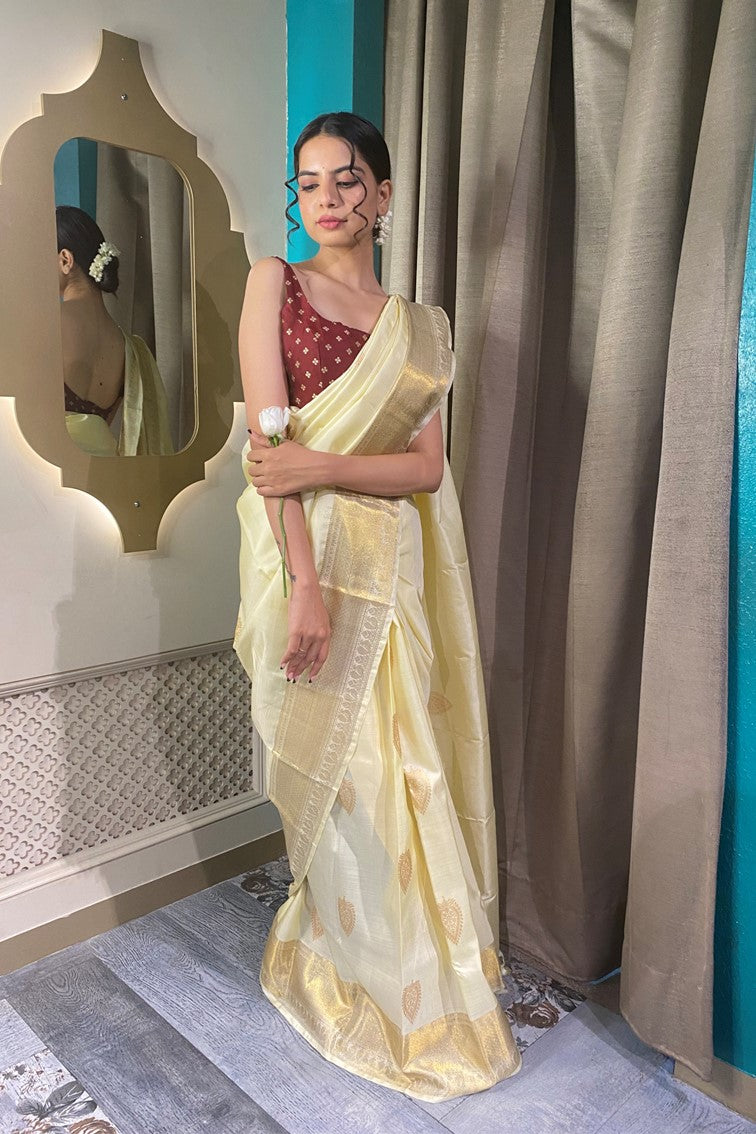 Classic beige and golden hand woven saree