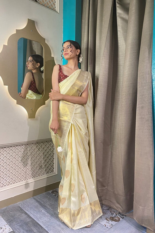 Classic beige and golden hand woven saree