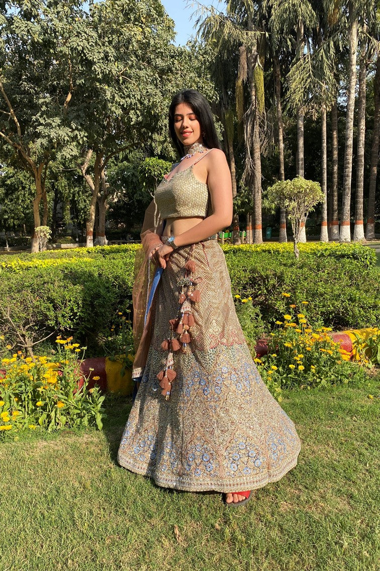 Glamorous golden color floral and geometrical motif embroidered lehanga set