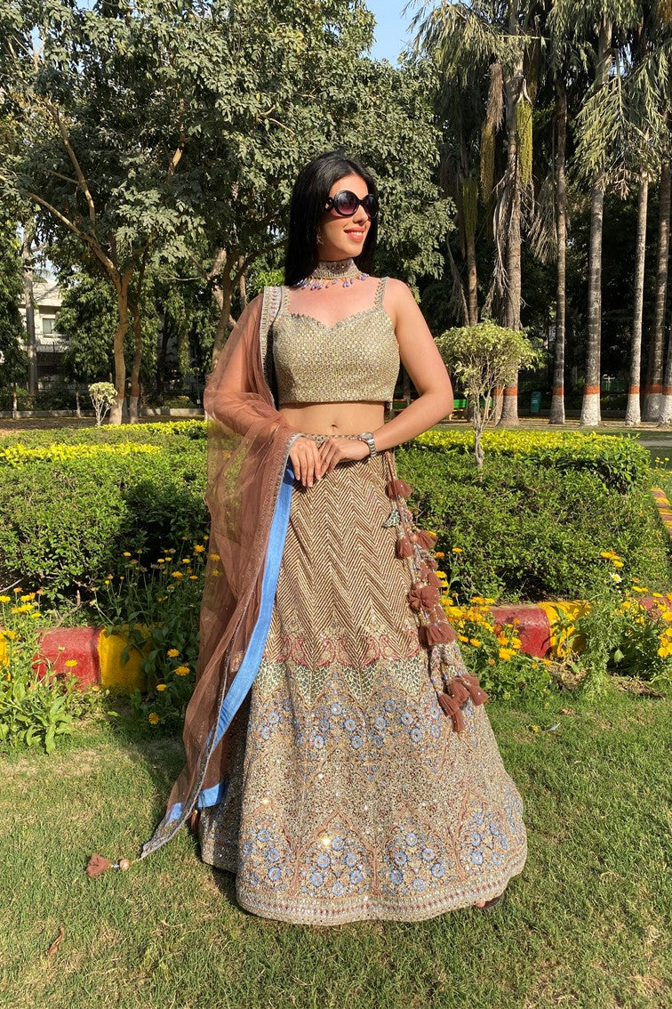 Glamorous golden color floral and geometrical motif embroidered lehanga set