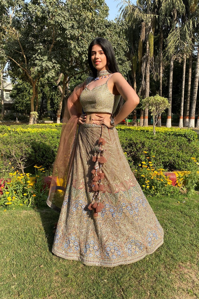 Glamorous golden color floral and geometrical motif embroidered lehanga set