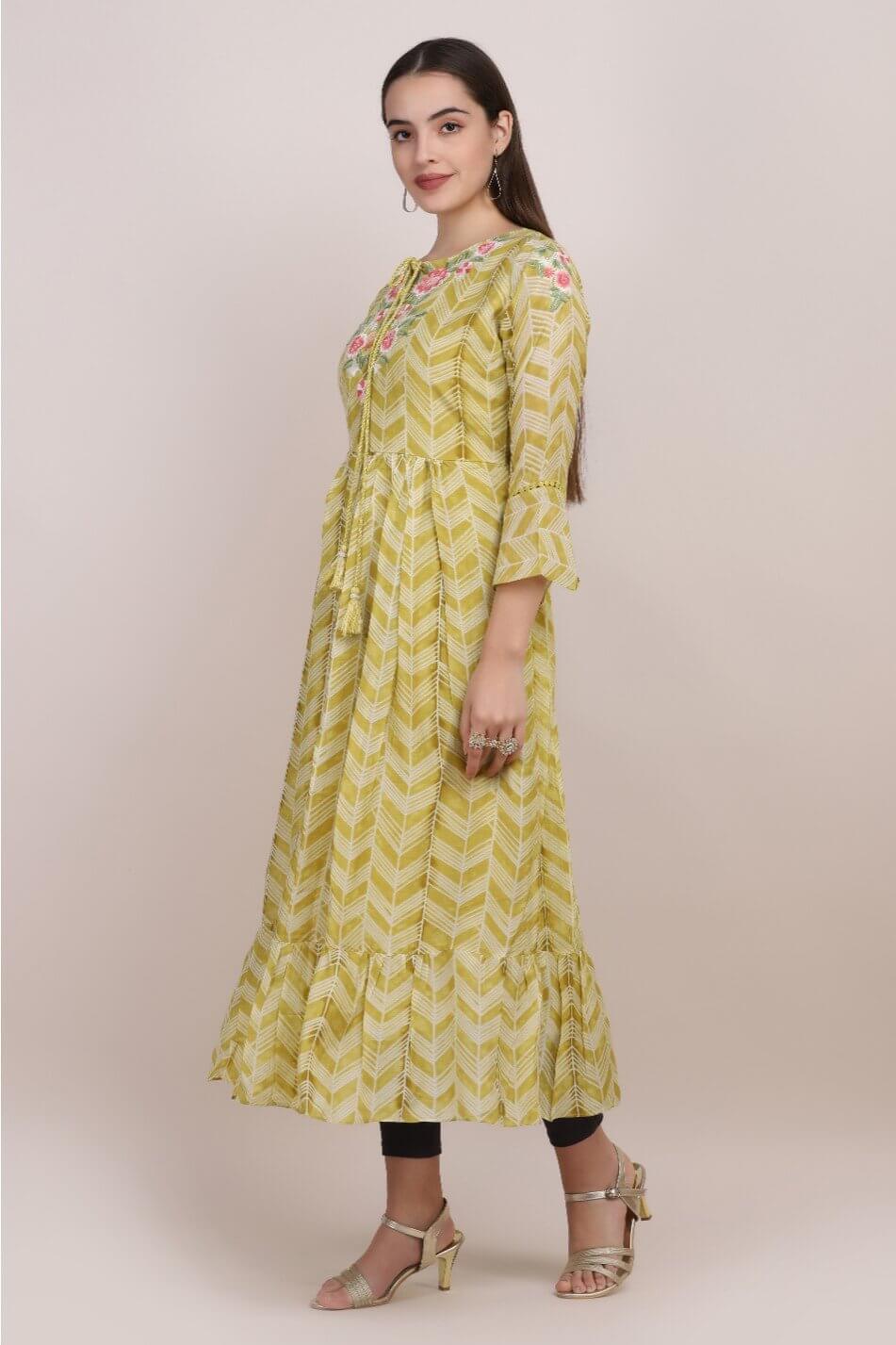 GREEN PRINTED KURTI WITH FLORAL EMBELLISHMENTS