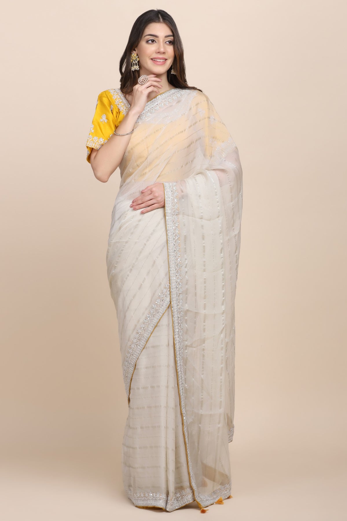 Elegant beige color stripes organza embroidered saree