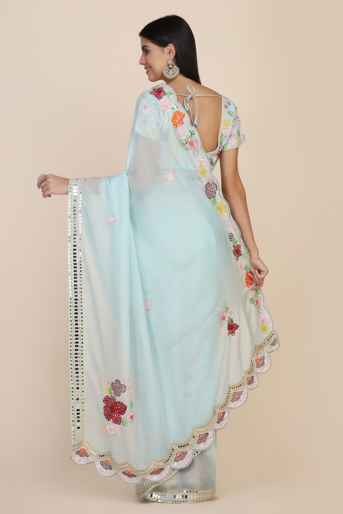 Beautiful aqua color floral motif embroidered saree