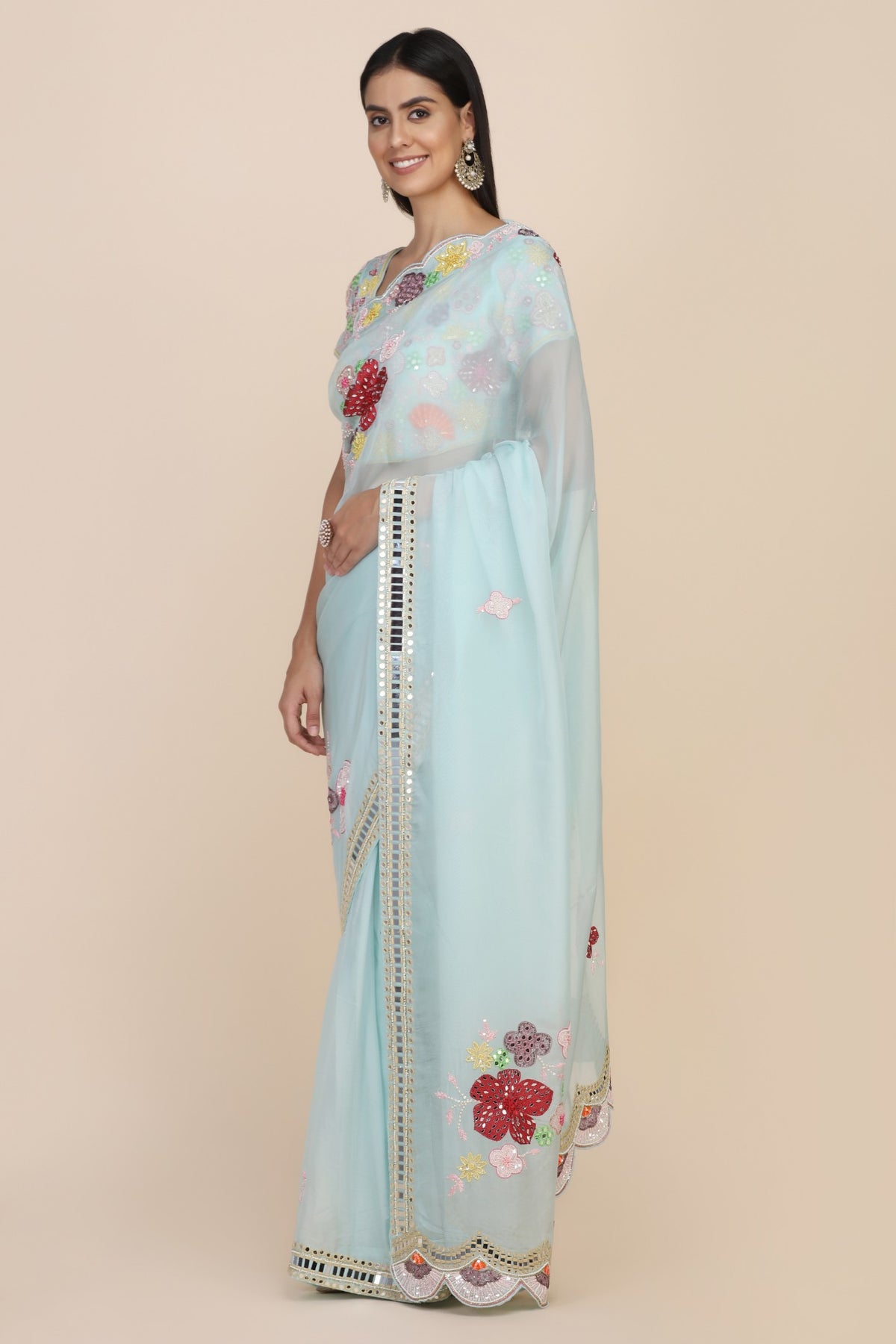 Beautiful aqua color floral motif embroidered saree