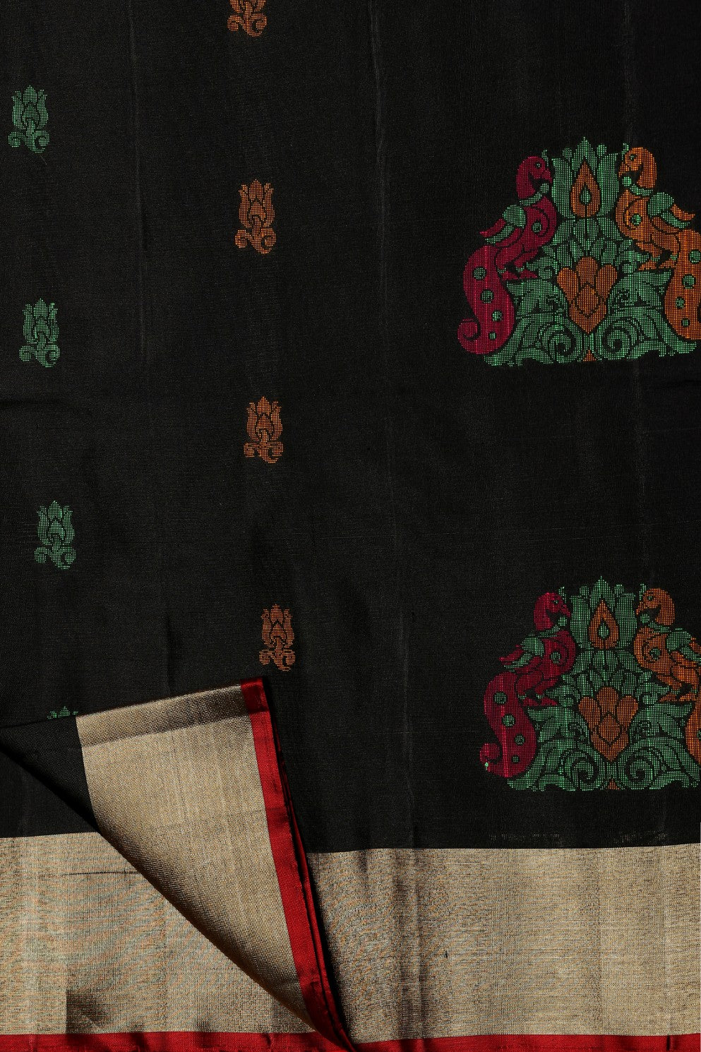 Classic black color floral motif woven saree