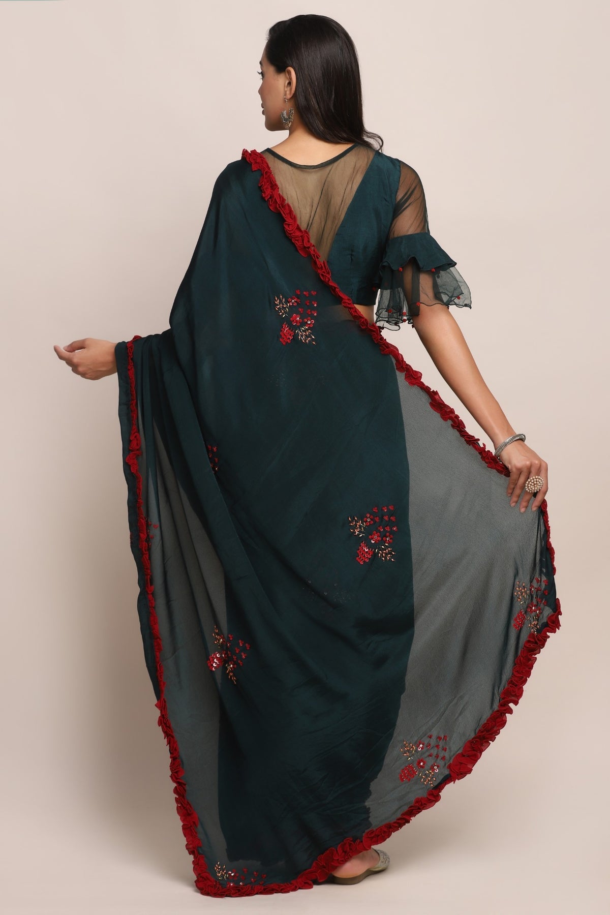 Beautiful green color floral motif embroidered saree