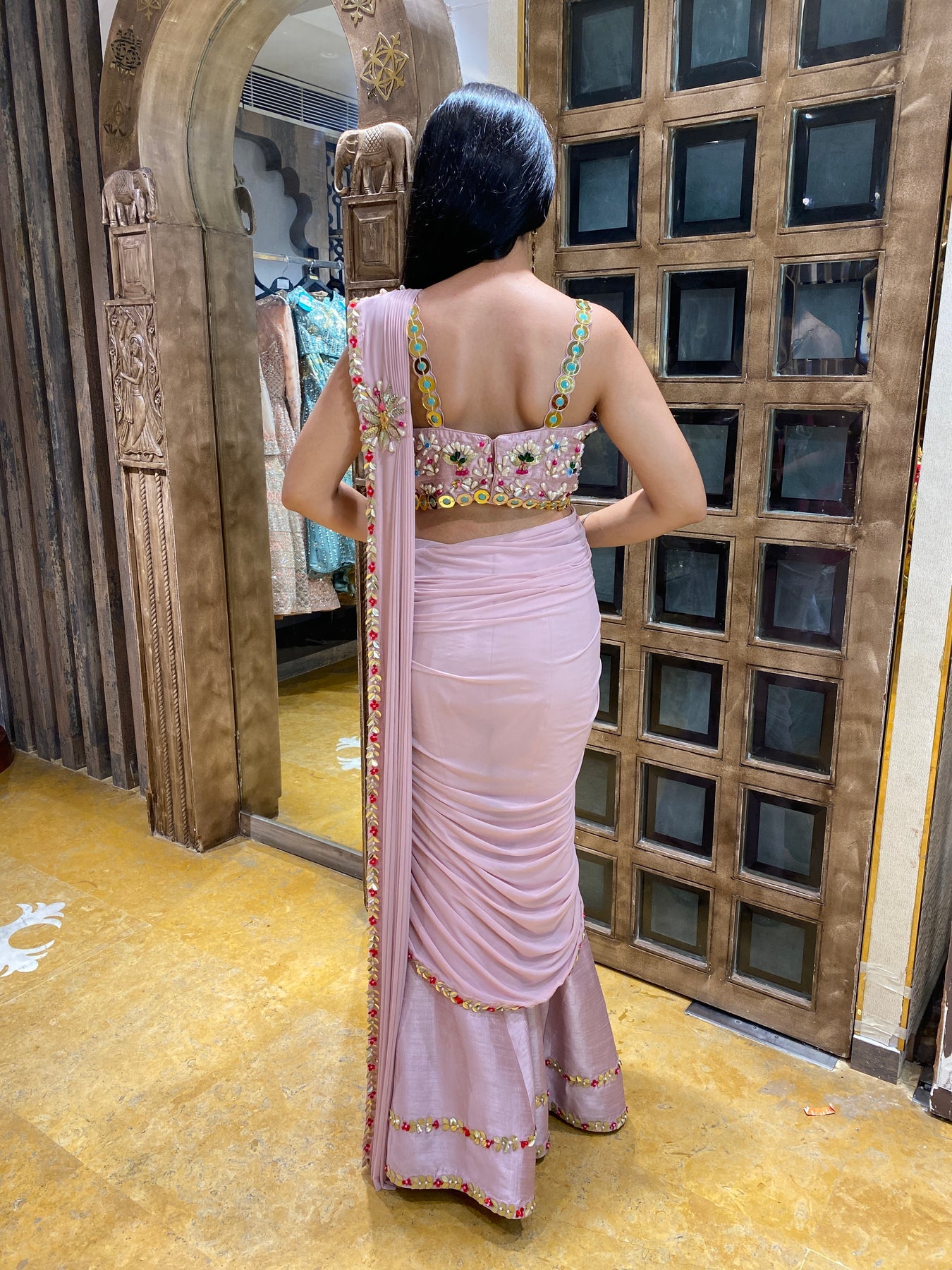 Elegant light pink color floral motif embroidered sharara cum drape saree