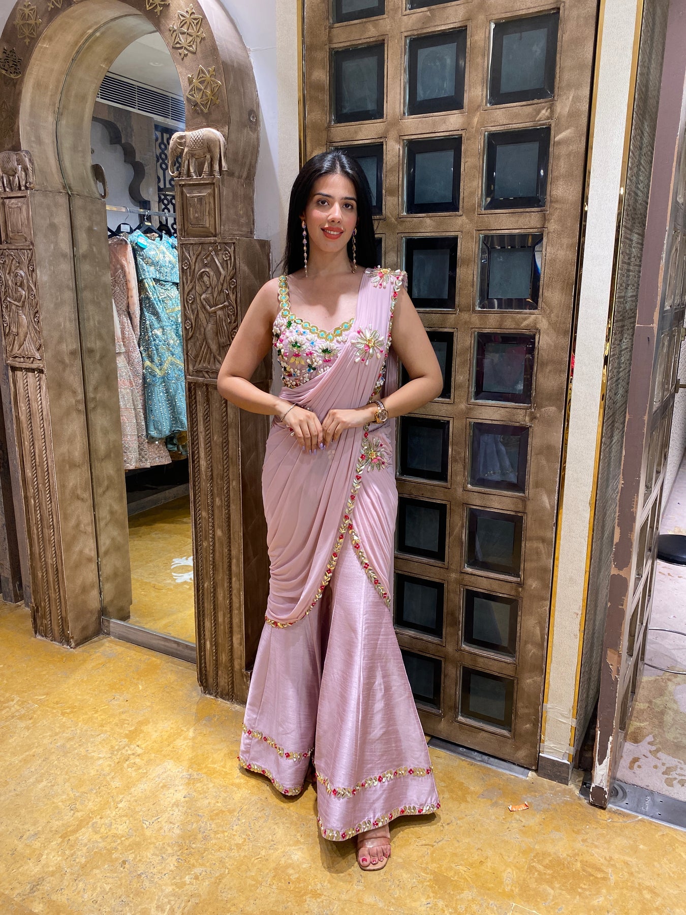 Elegant light pink color floral motif embroidered sharara cum drape saree