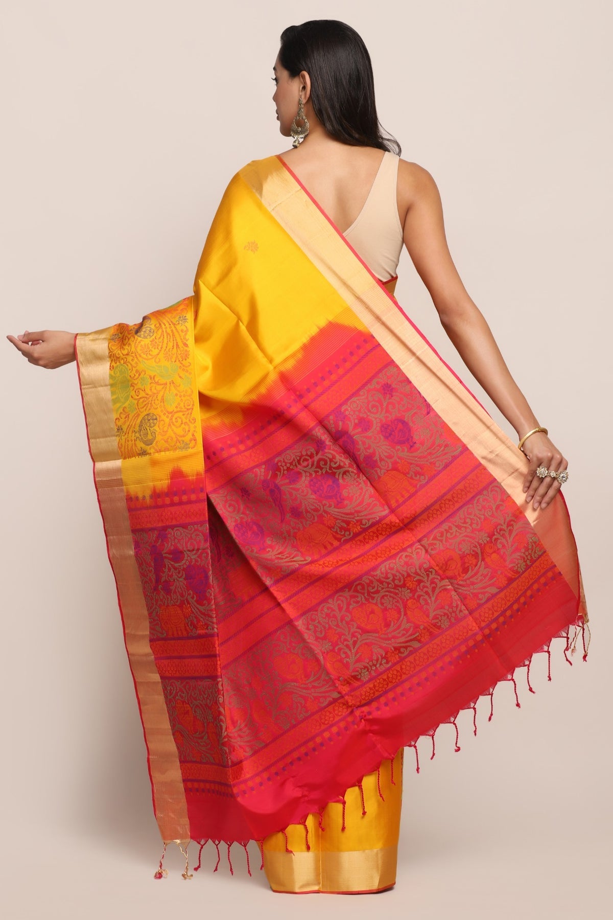 Adorable yellow color floral motif woven saree