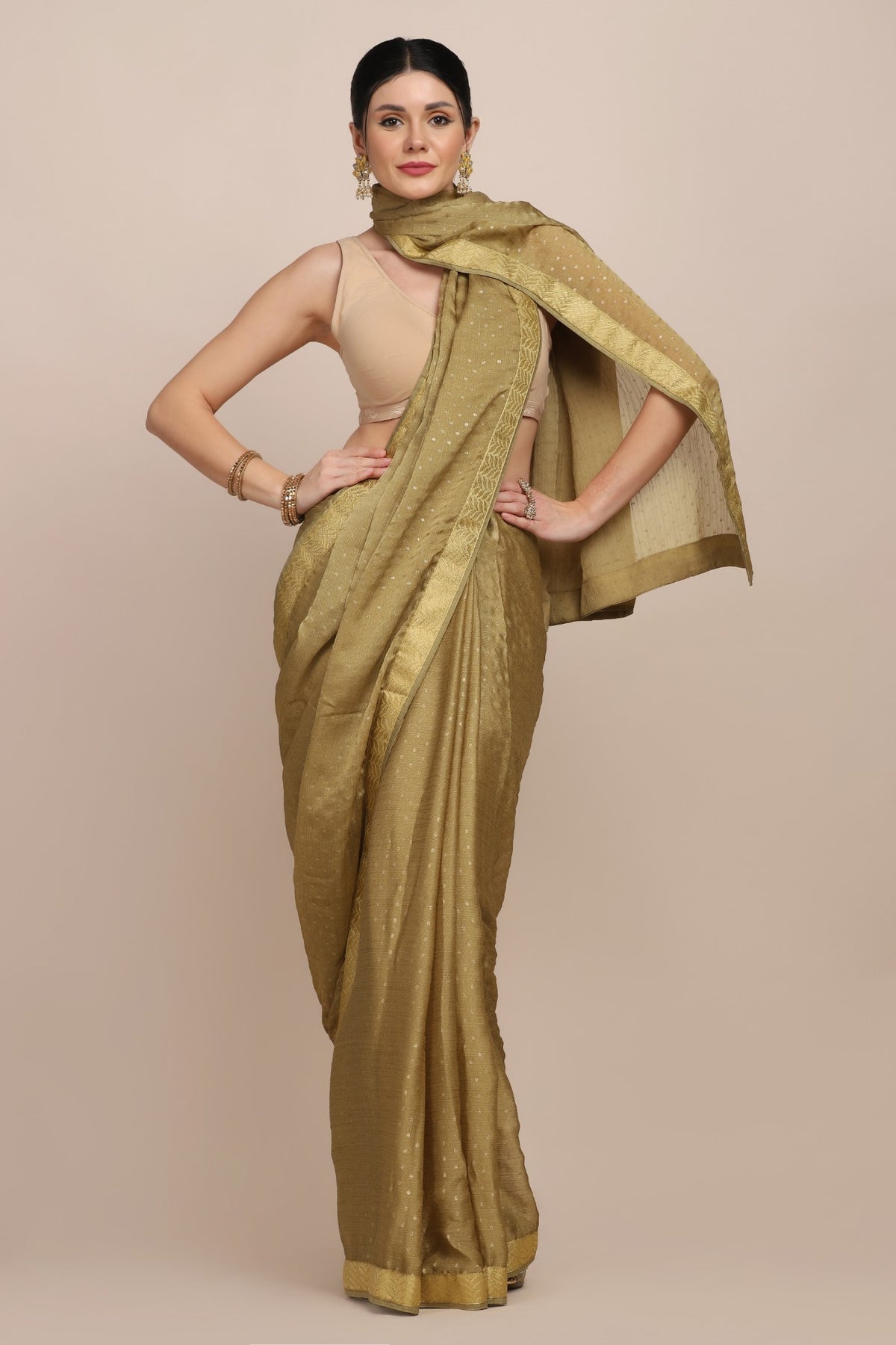 Classic green color self on self woven saree