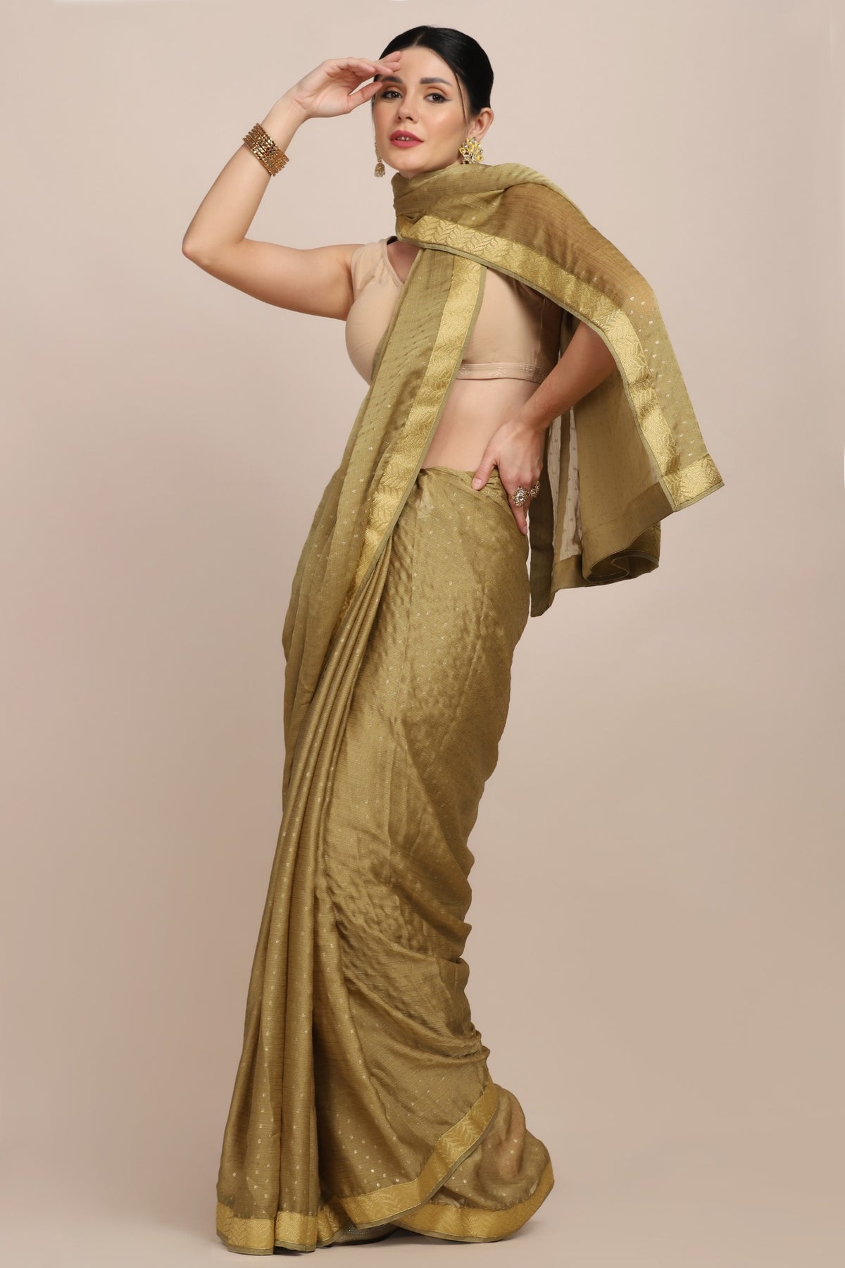 Classic green color self on self woven saree