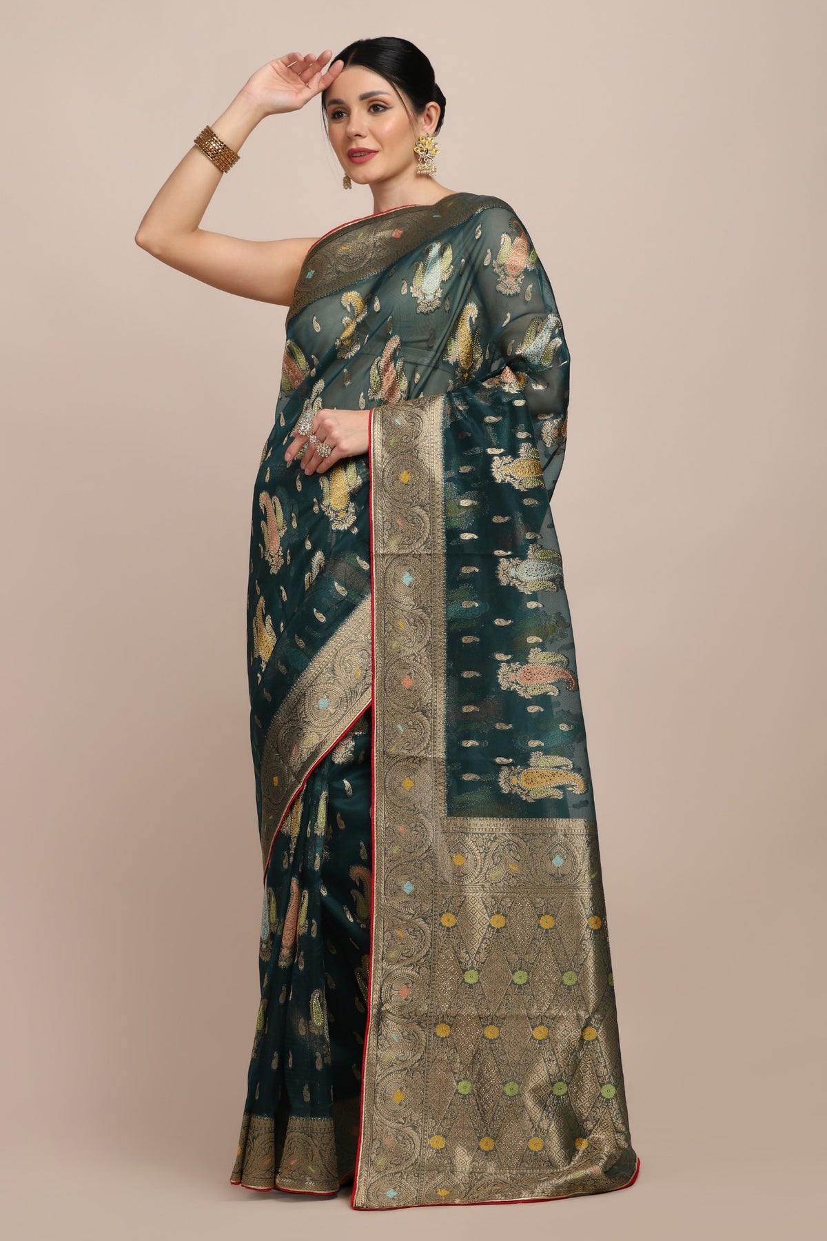 Beautiful bottle green color paisley motif woven saree