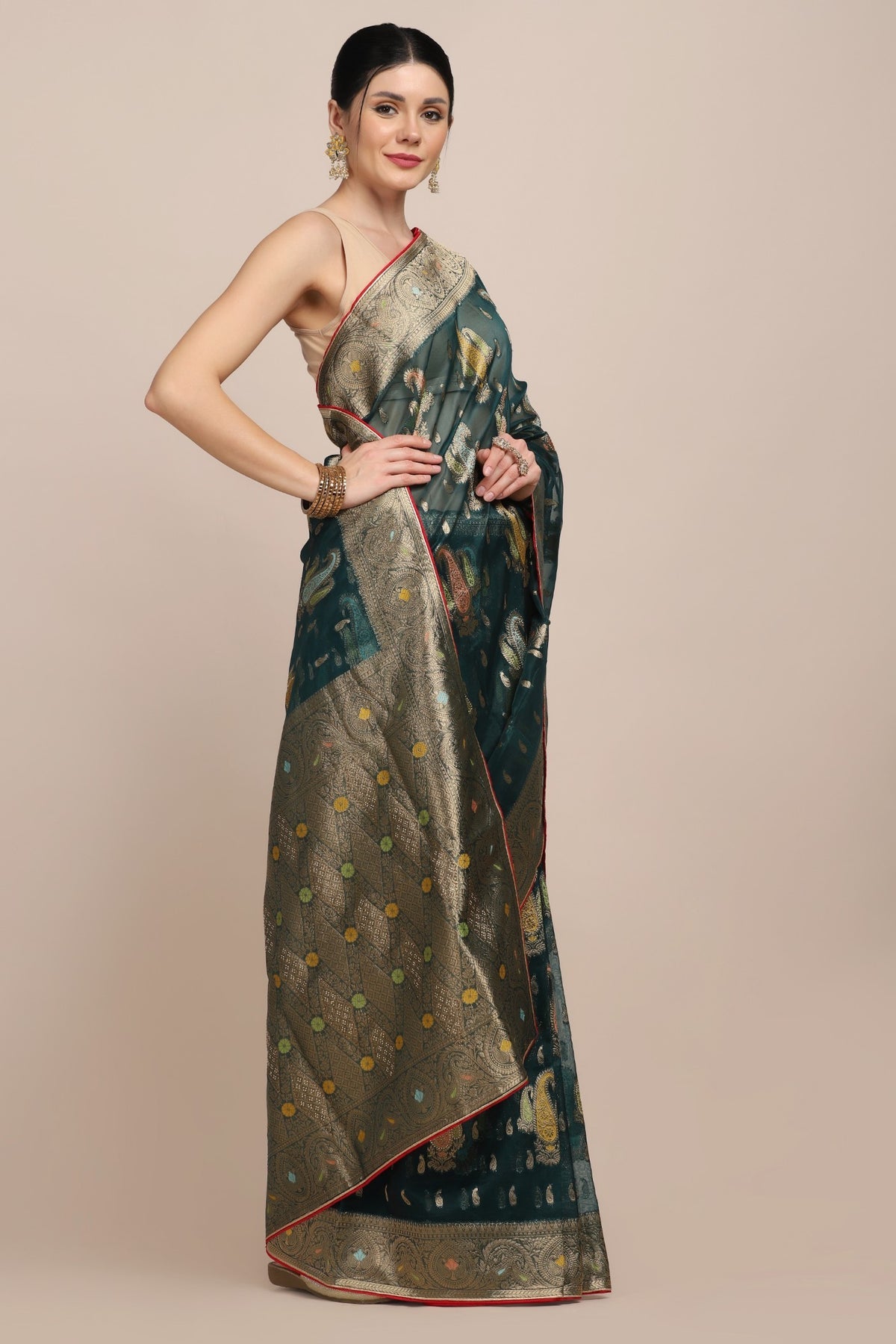 Beautiful bottle green color paisley motif woven saree