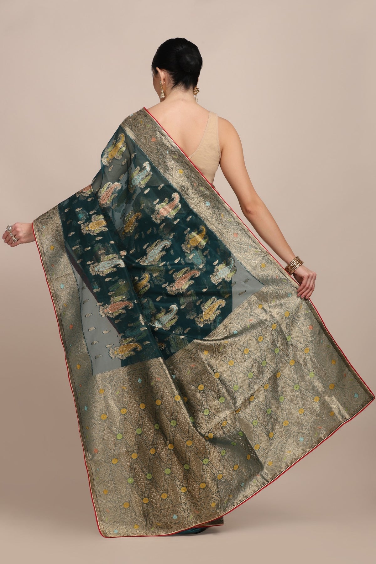 Beautiful bottle green color paisley motif woven saree