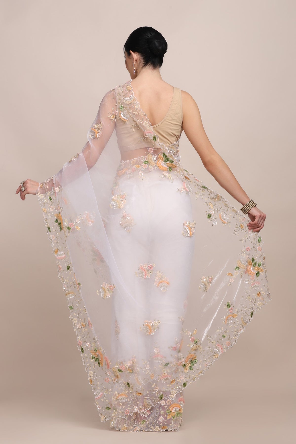 Classy white color floral embroidered saree