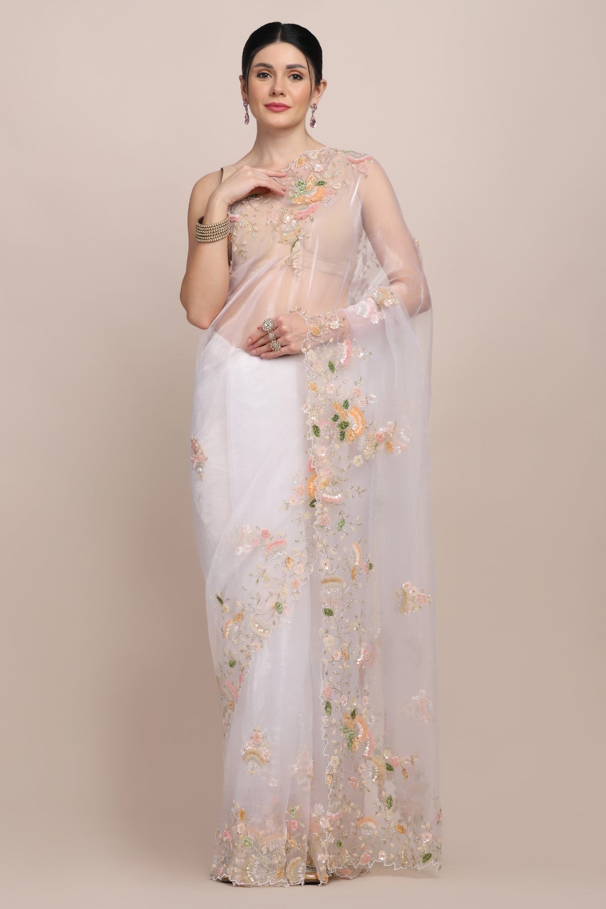 Classy white color floral embroidered saree