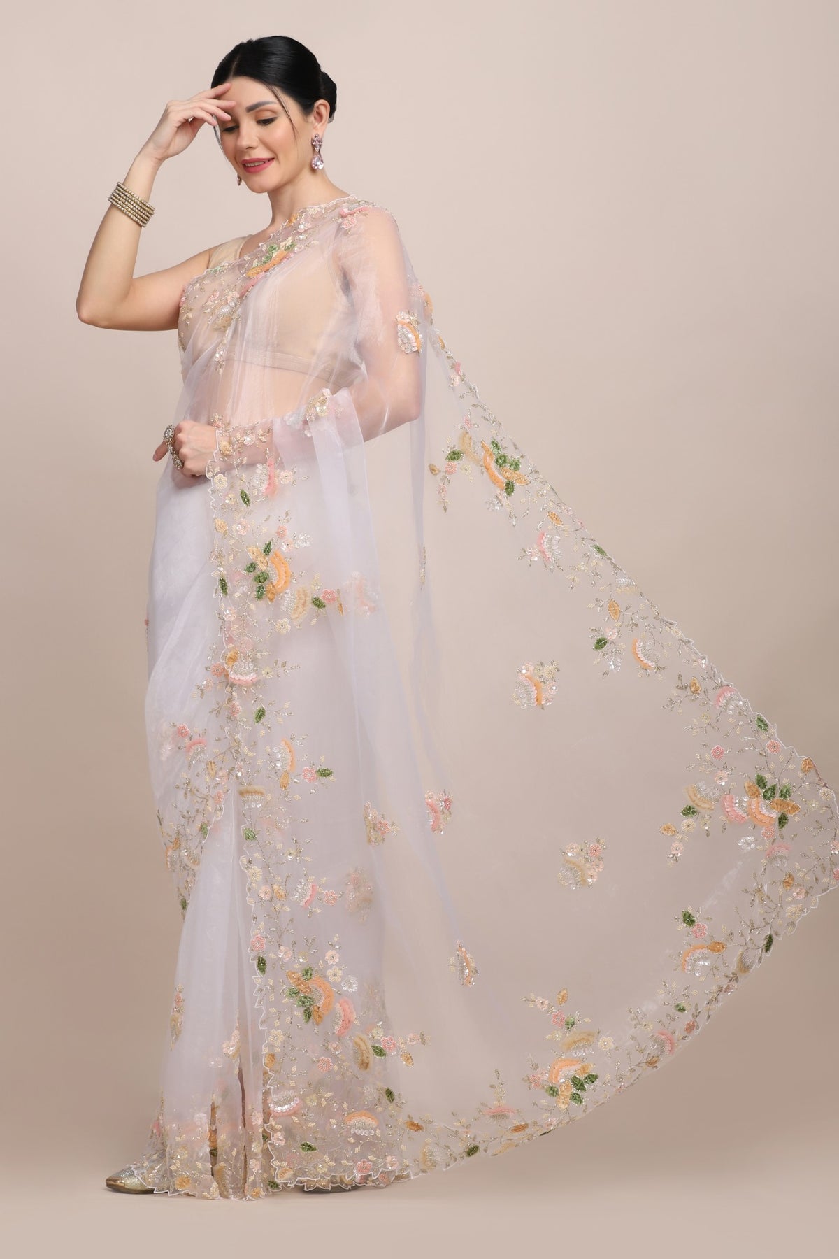 Classy white color floral embroidered saree