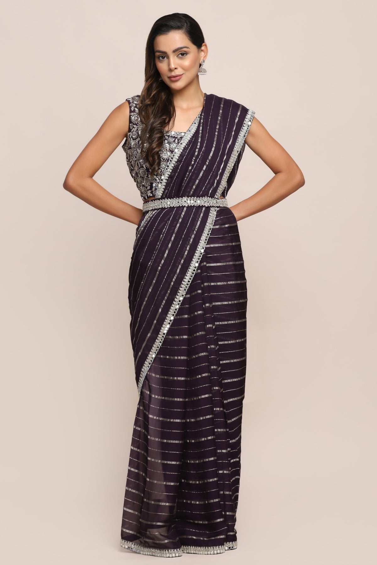 Elegant purple color floral motif embroidered saree