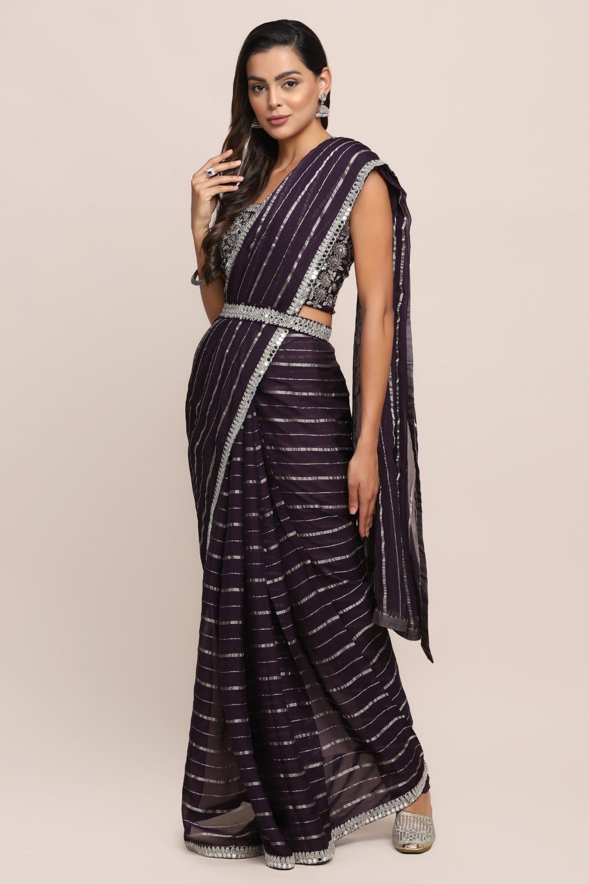 Elegant purple color floral motif embroidered saree