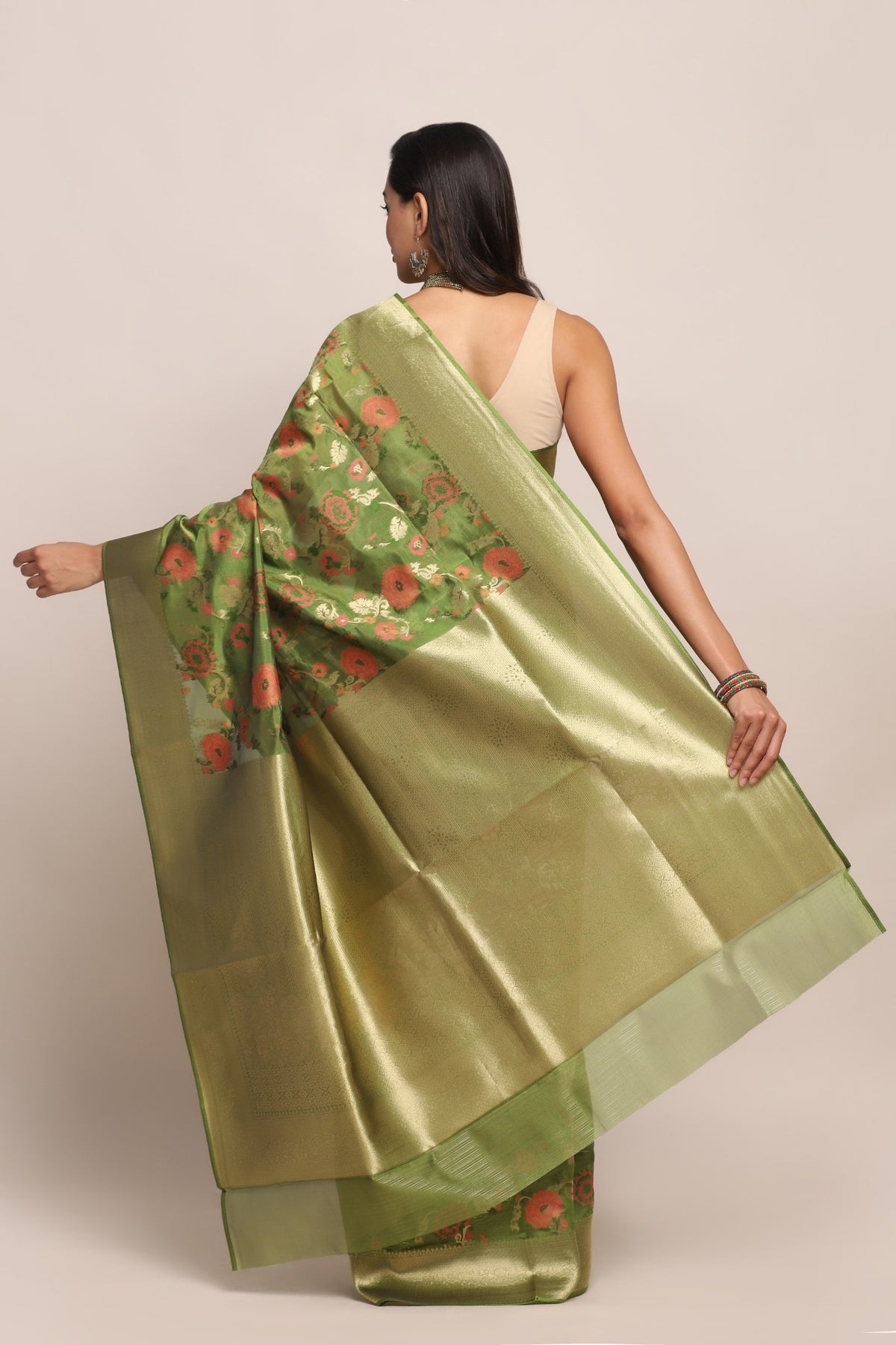 Classic green color floral motif woven saree