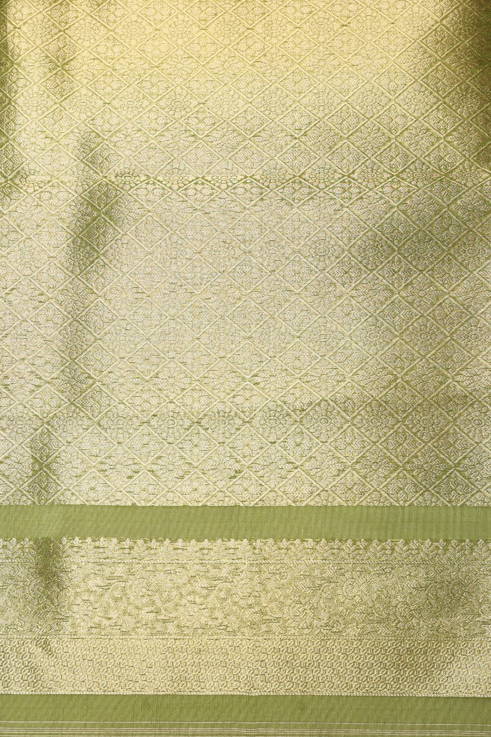 Classic green color floral motif woven saree