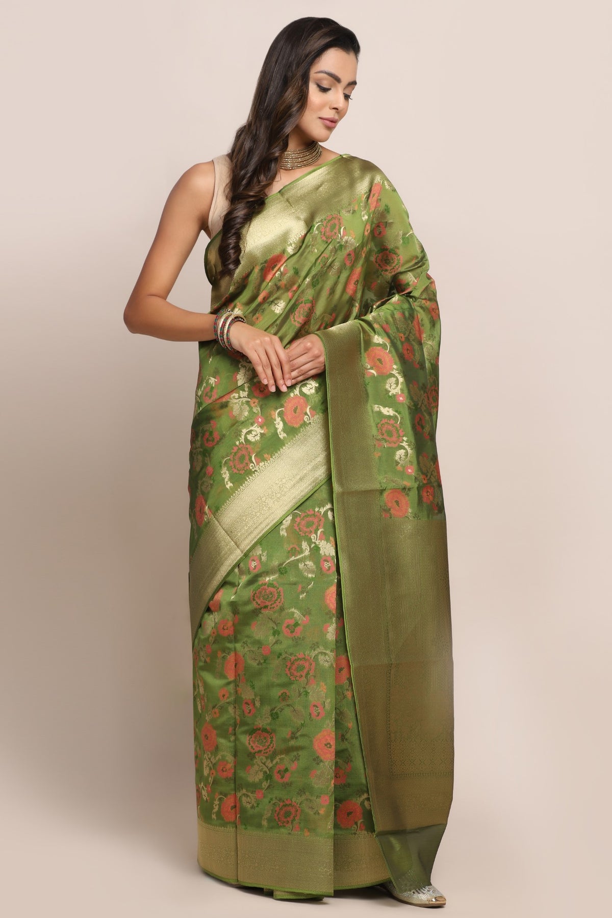 Classic green color floral motif woven saree