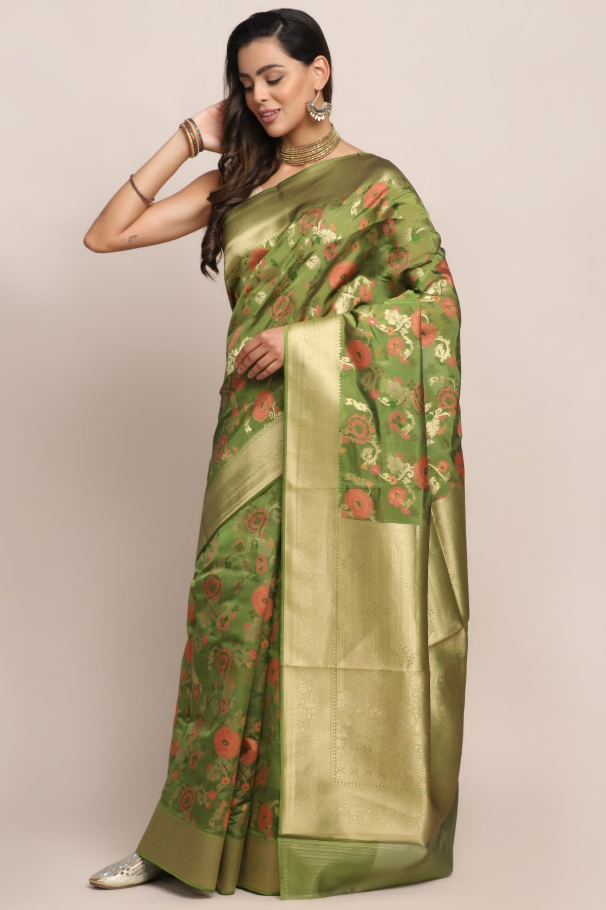 Classic green color floral motif woven saree
