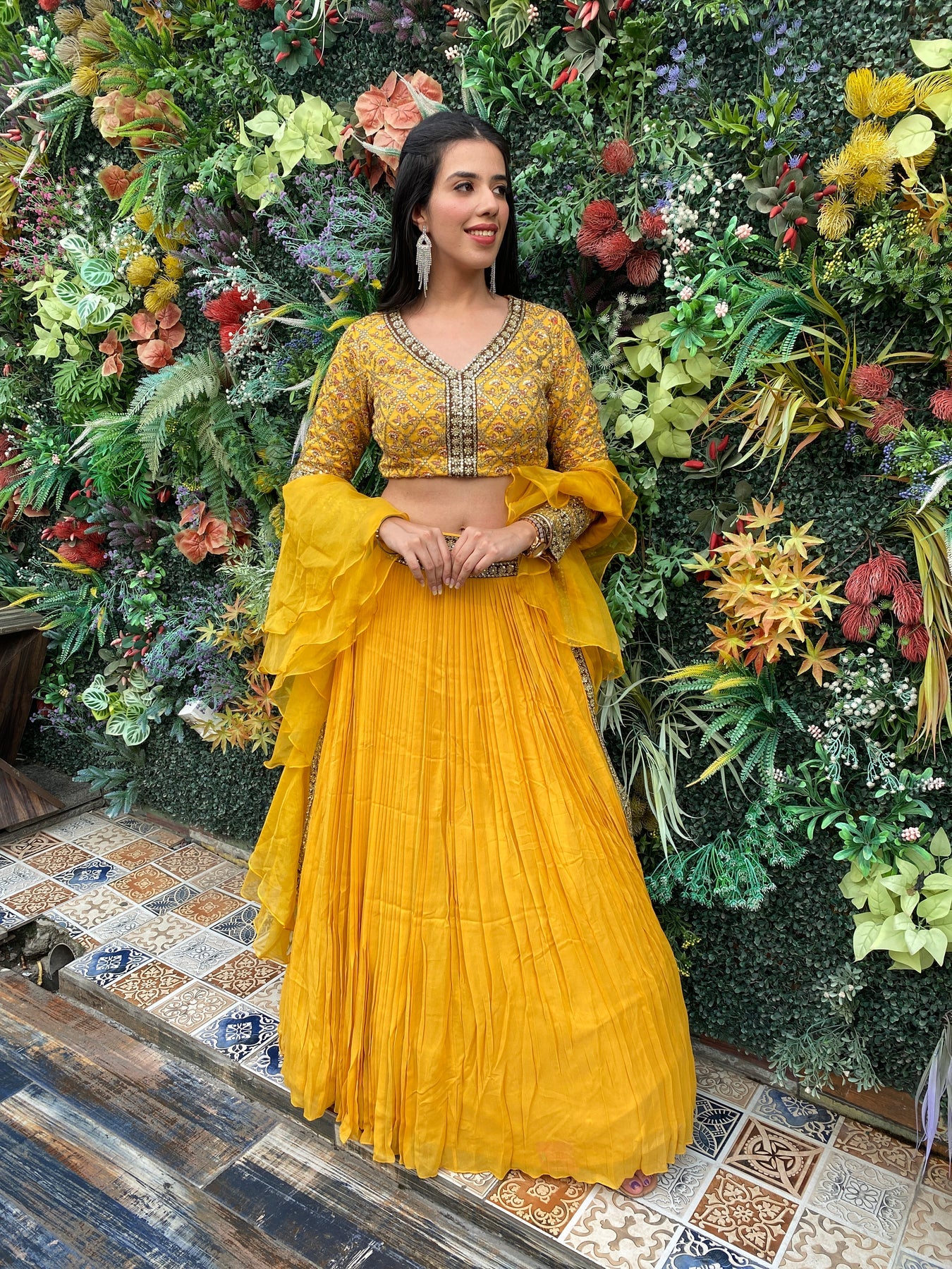 Gorgeous yellow color floral motif embroidered lehanga