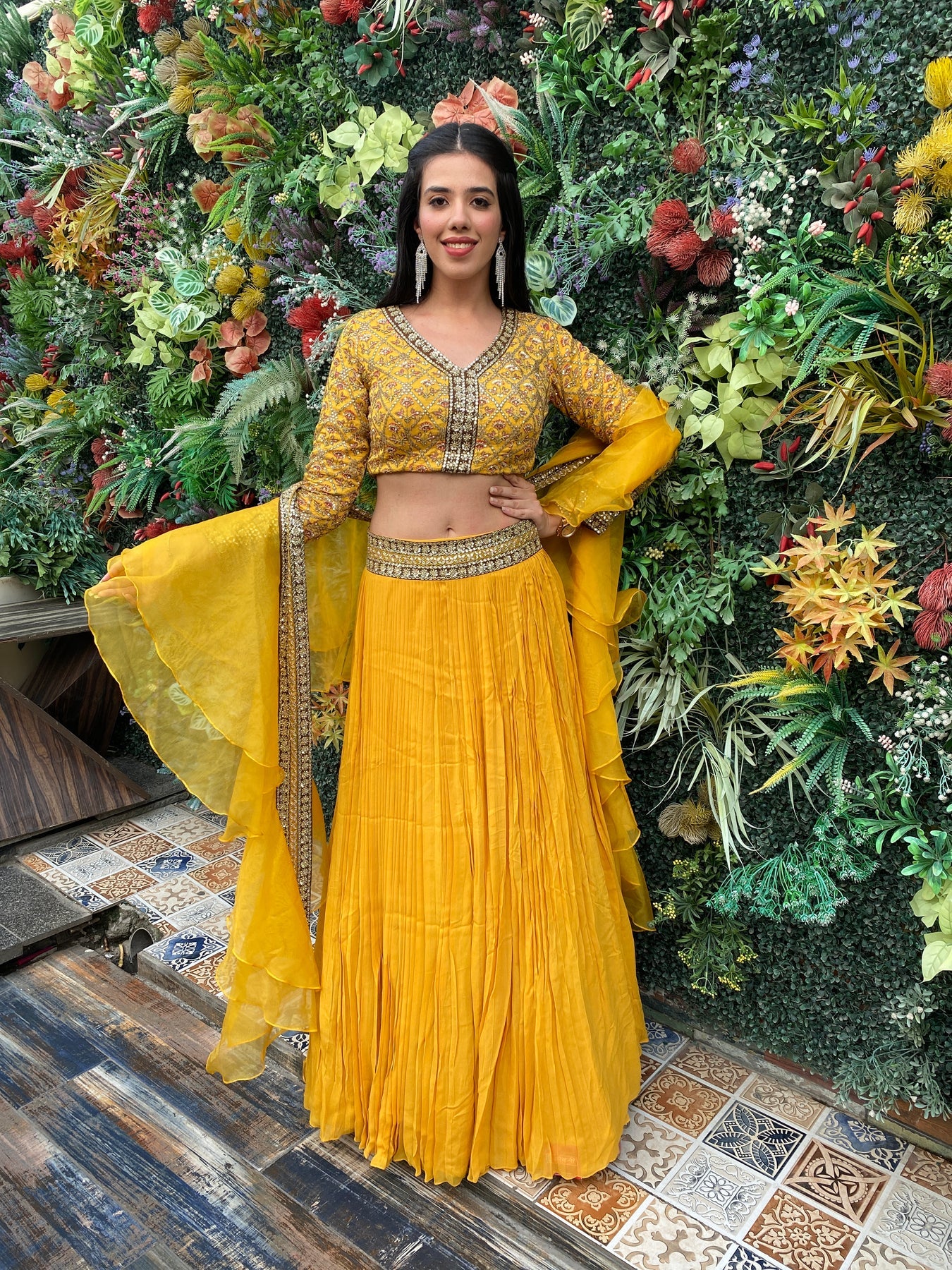 Gorgeous yellow color floral motif embroidered lehanga