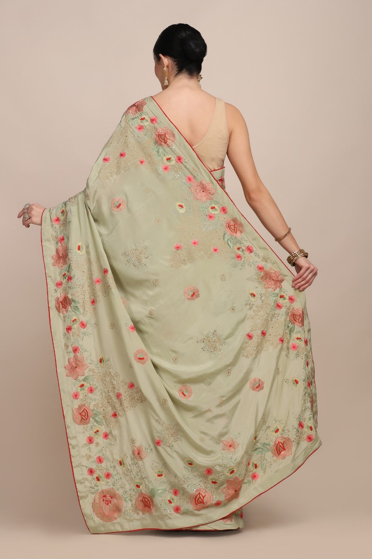 Adorable green color floral motif embroidered saree