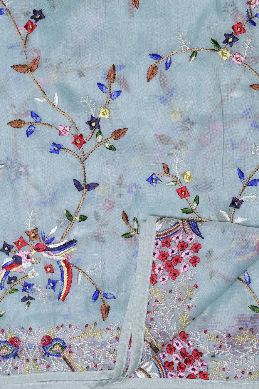 Elegant sky blue color floral motif embroidered saree