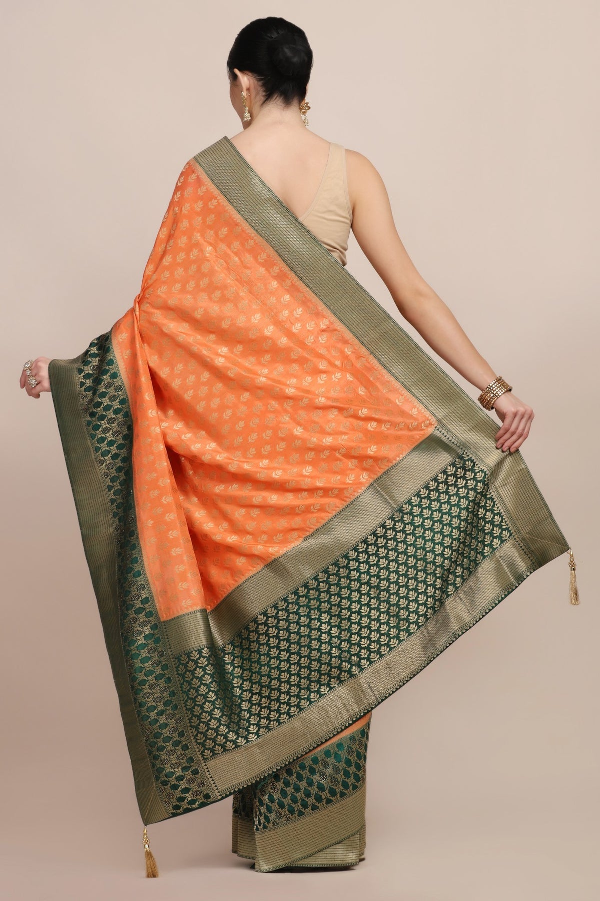 Classy orange color floral motif woven saree