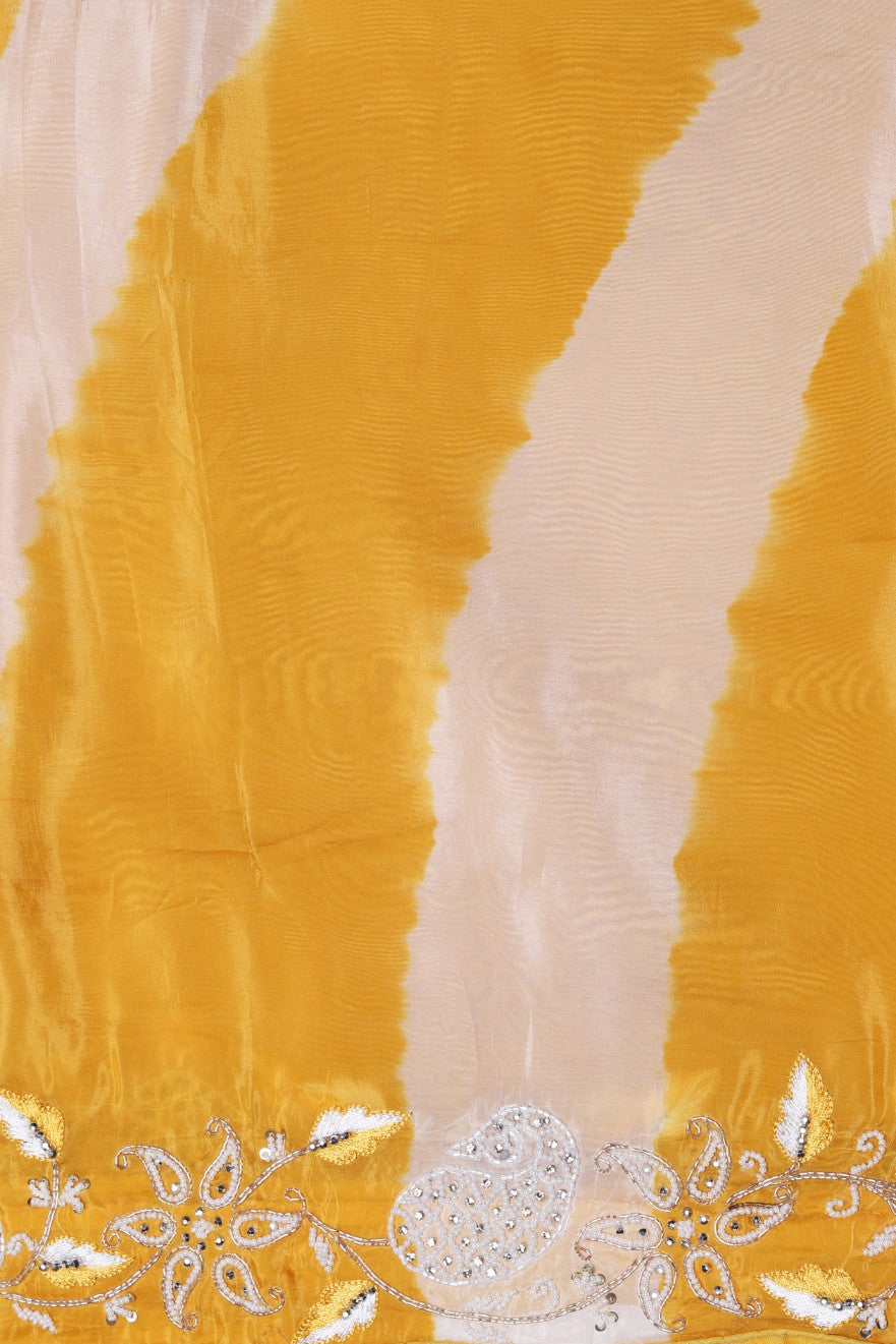 Elegant yellow color tie and dye embroidered saree