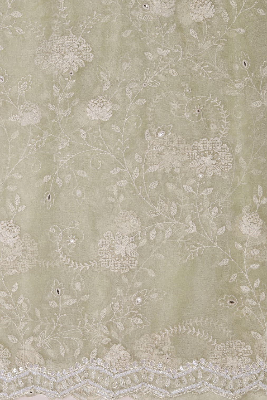 Beautiful light green color floral jaal embroidered saree