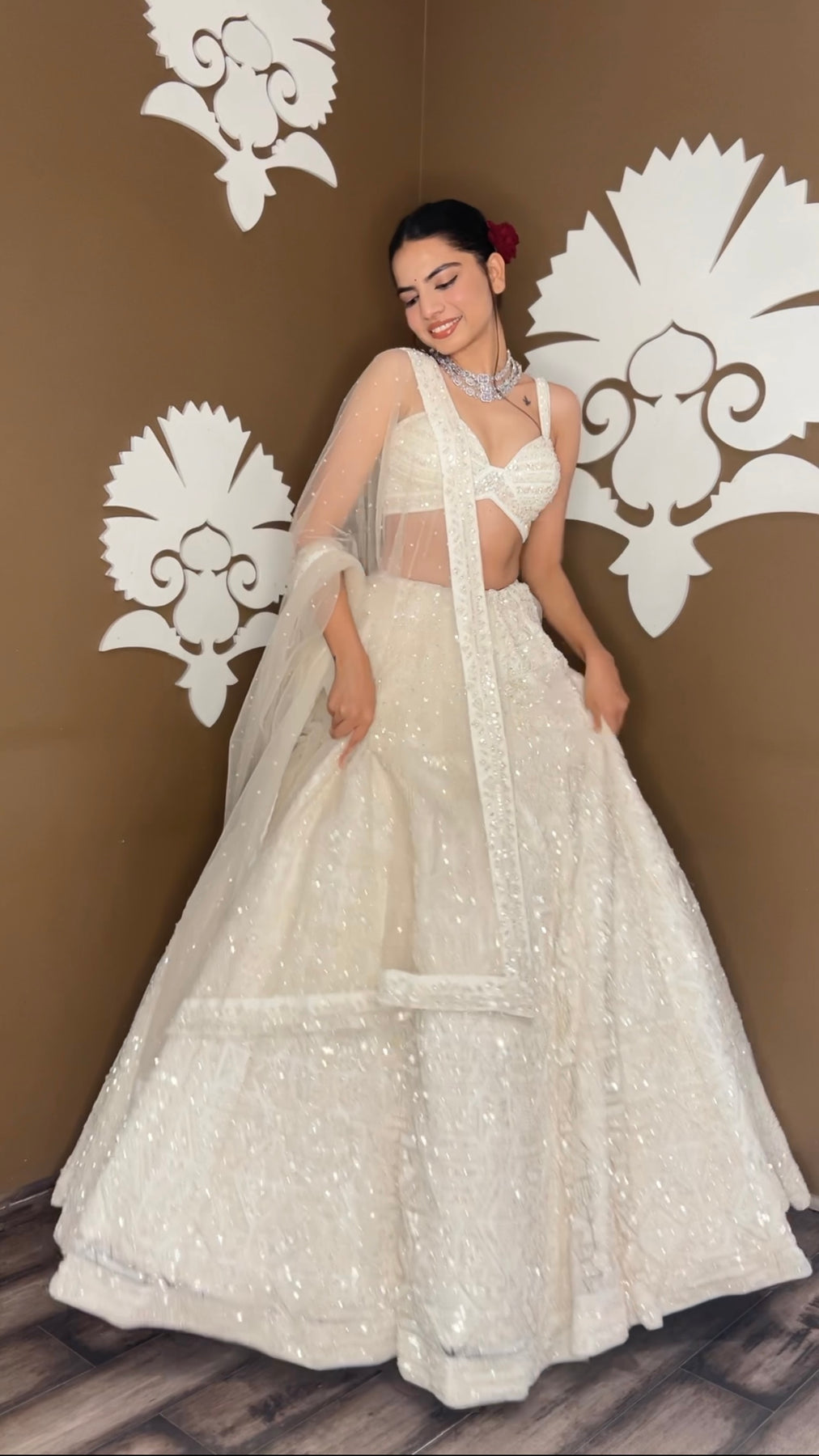 Beautiful white color floral motif embroidered lehanga