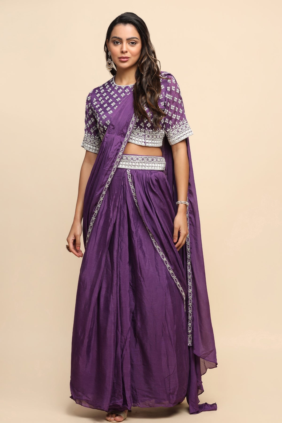 Elegant purple color floral motif embroidered skirt with draped saree