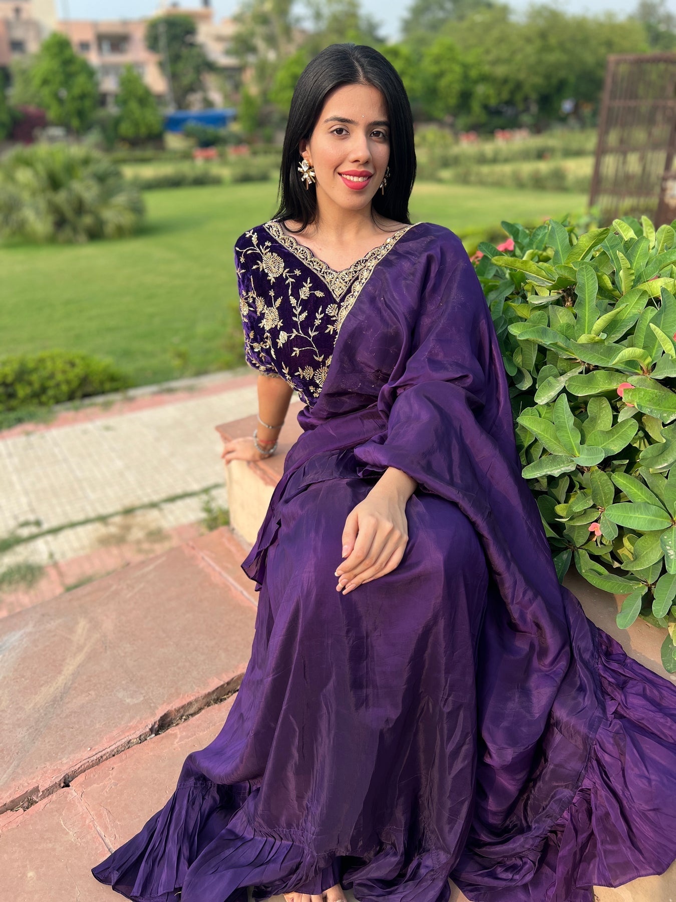 elegant purple color embroidered drape saree