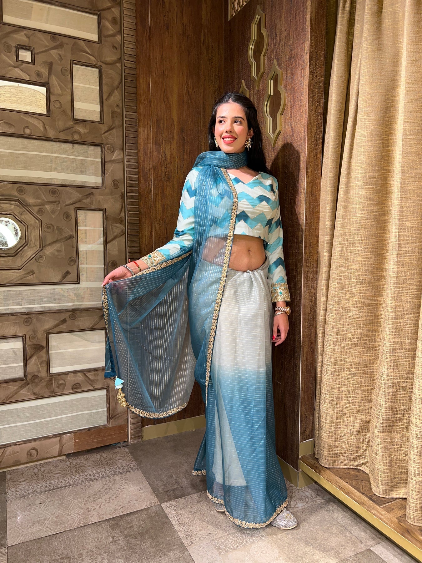 elegant blue color floral motif saree