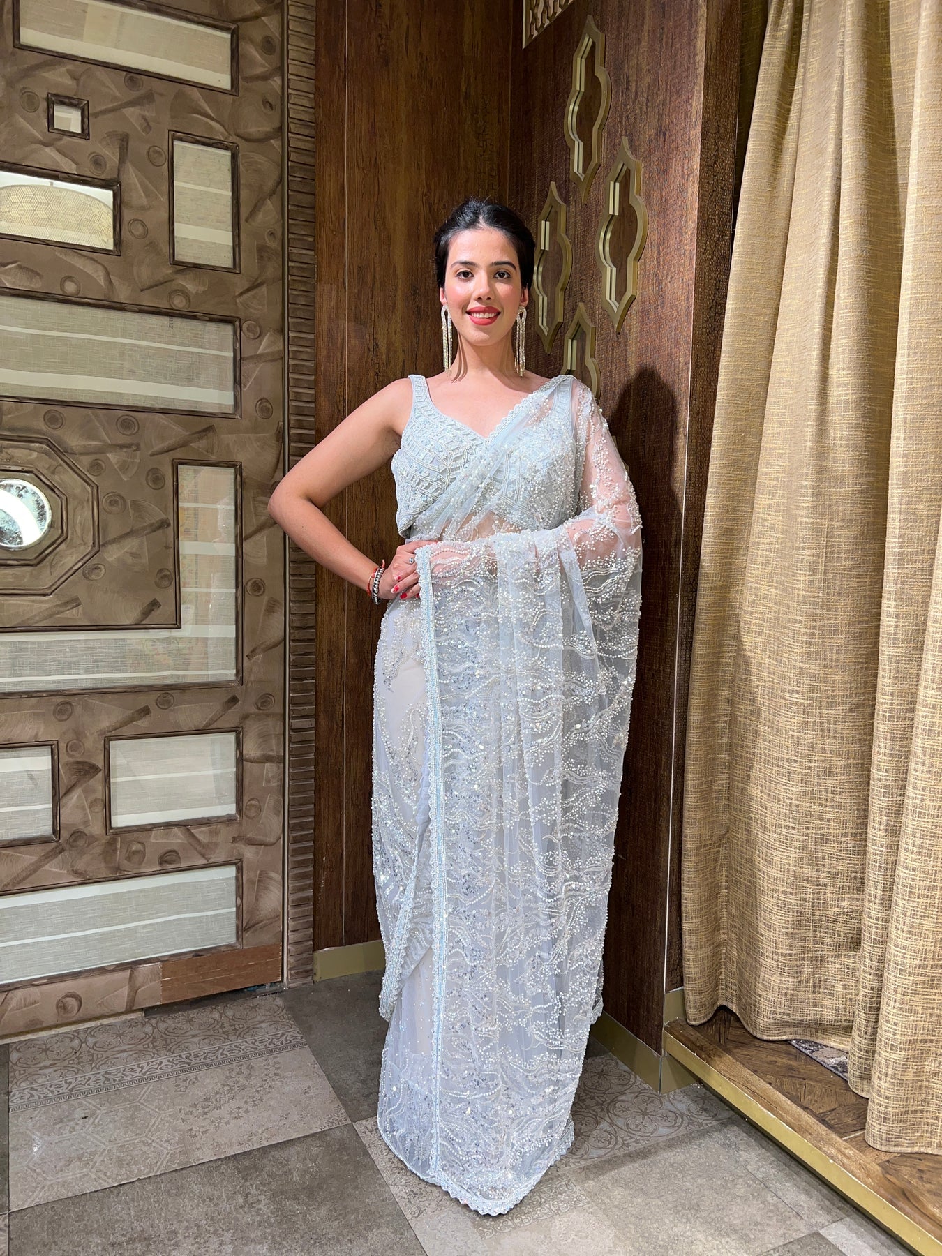 Beautiful sky blue floral motif embroidered saree