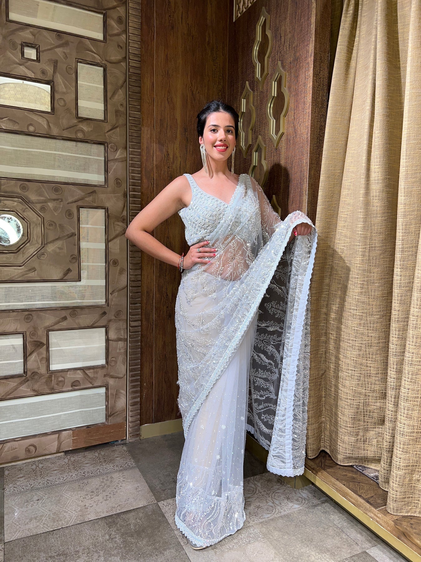 Beautiful sky blue floral motif embroidered saree