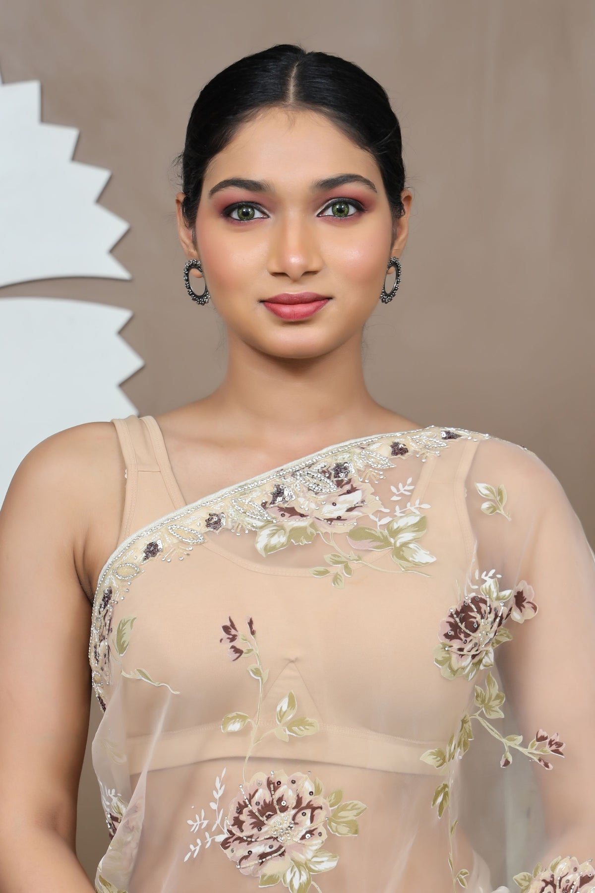 classy cream color floral motif embroidered saree