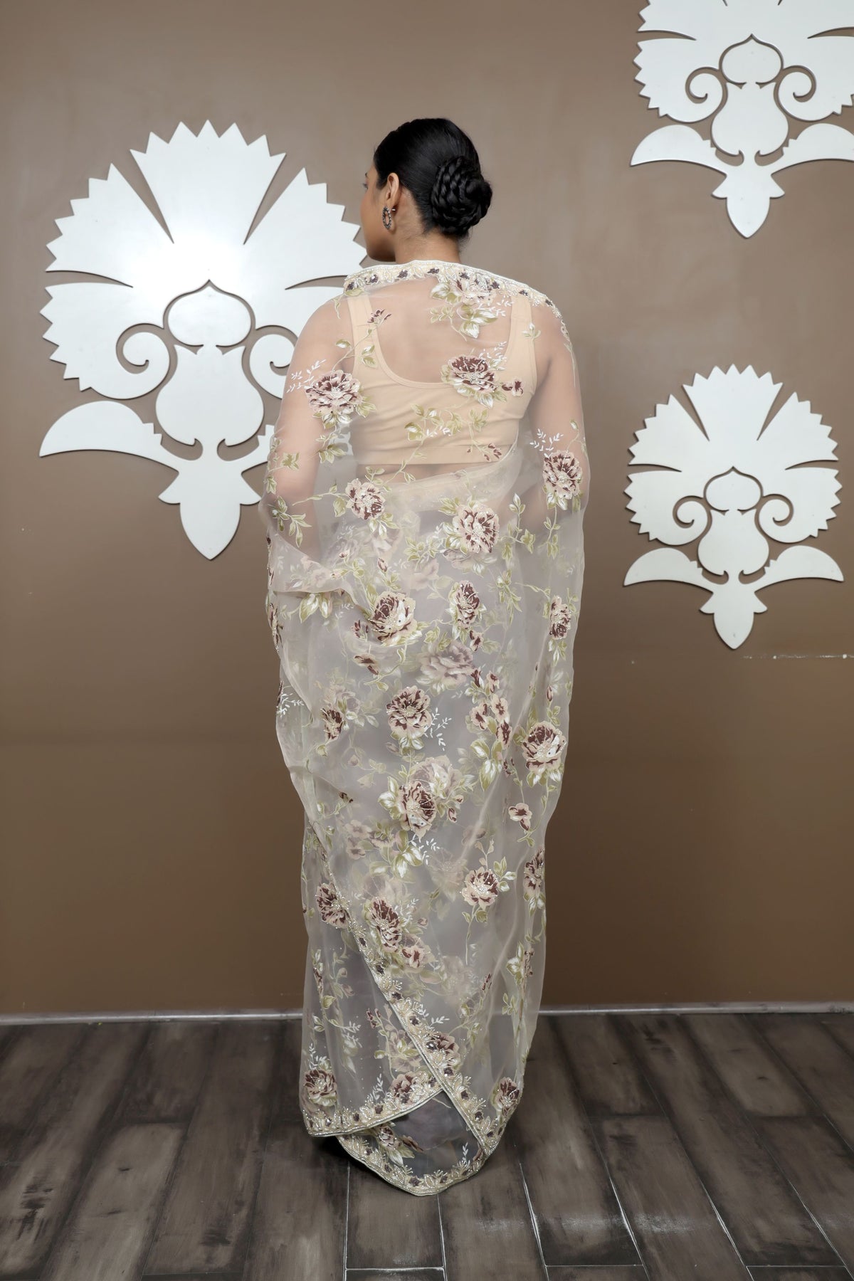 classy cream color floral motif embroidered saree