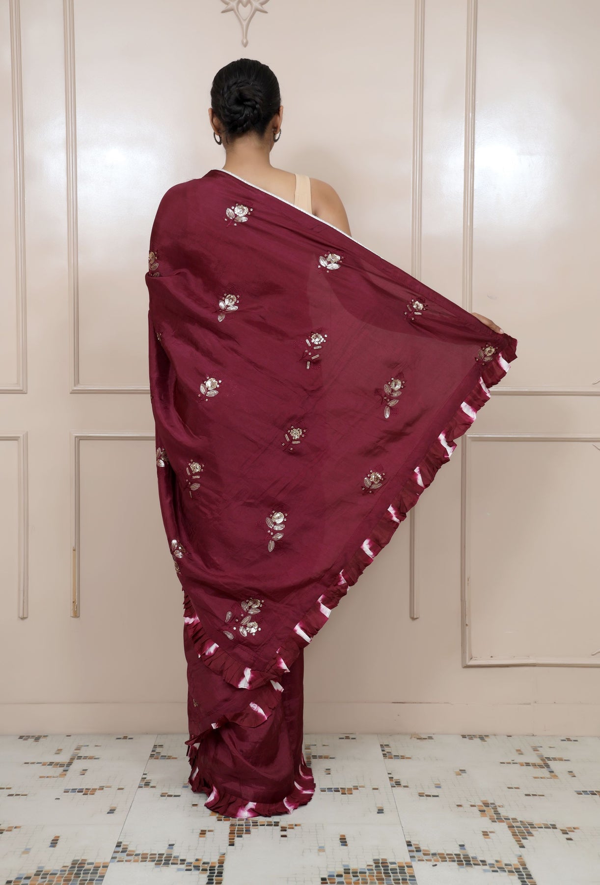 Adorable Wine Colour Floral Motif Embroidered Saree