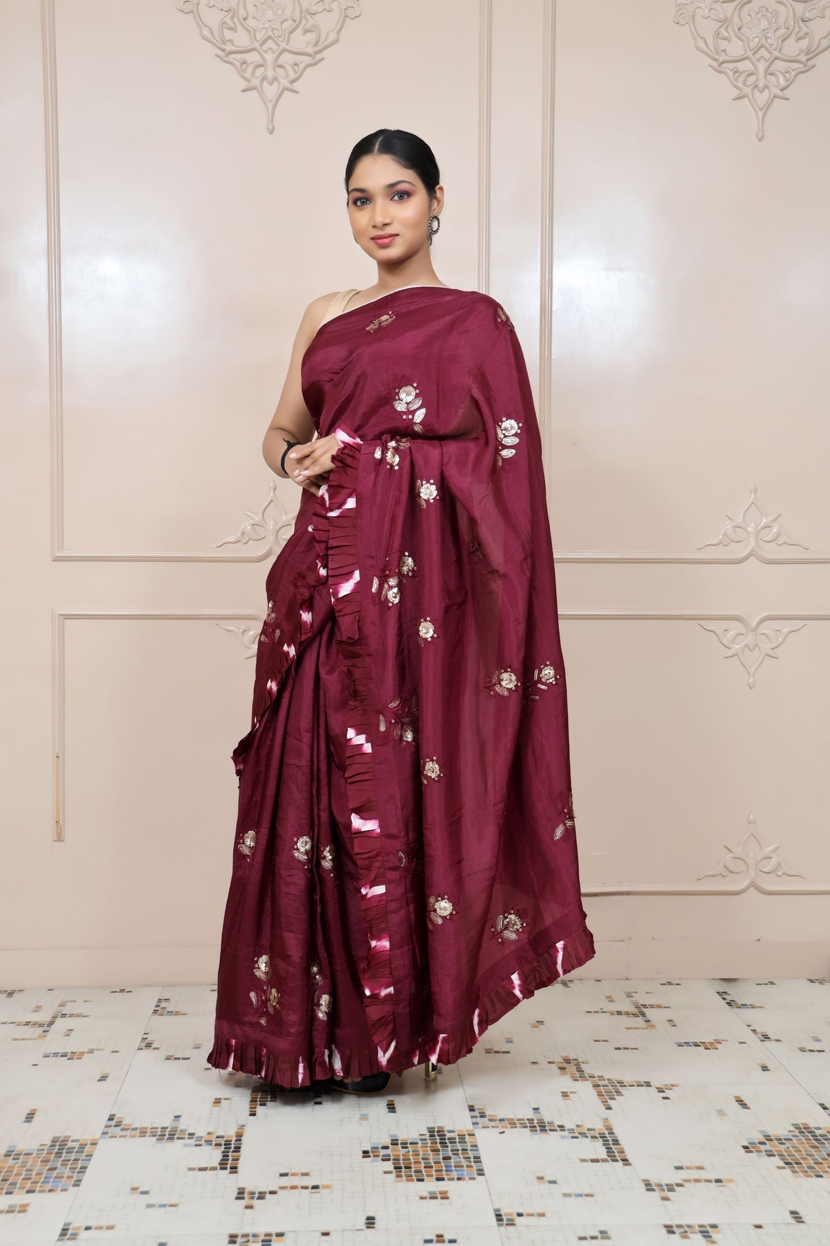 Adorable Wine Colour Floral Motif Embroidered Saree