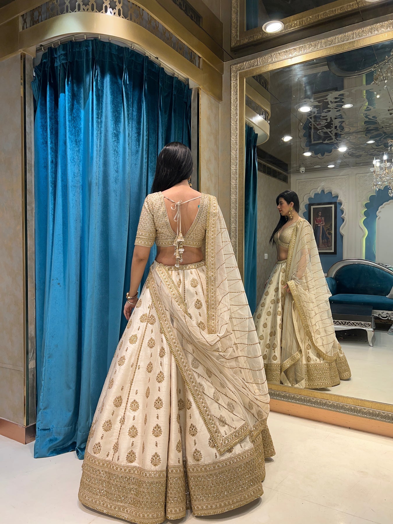 adorable off white floral motif embroidered lehenga set