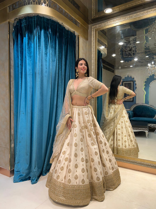 adorable off white floral motif embroidered lehenga set